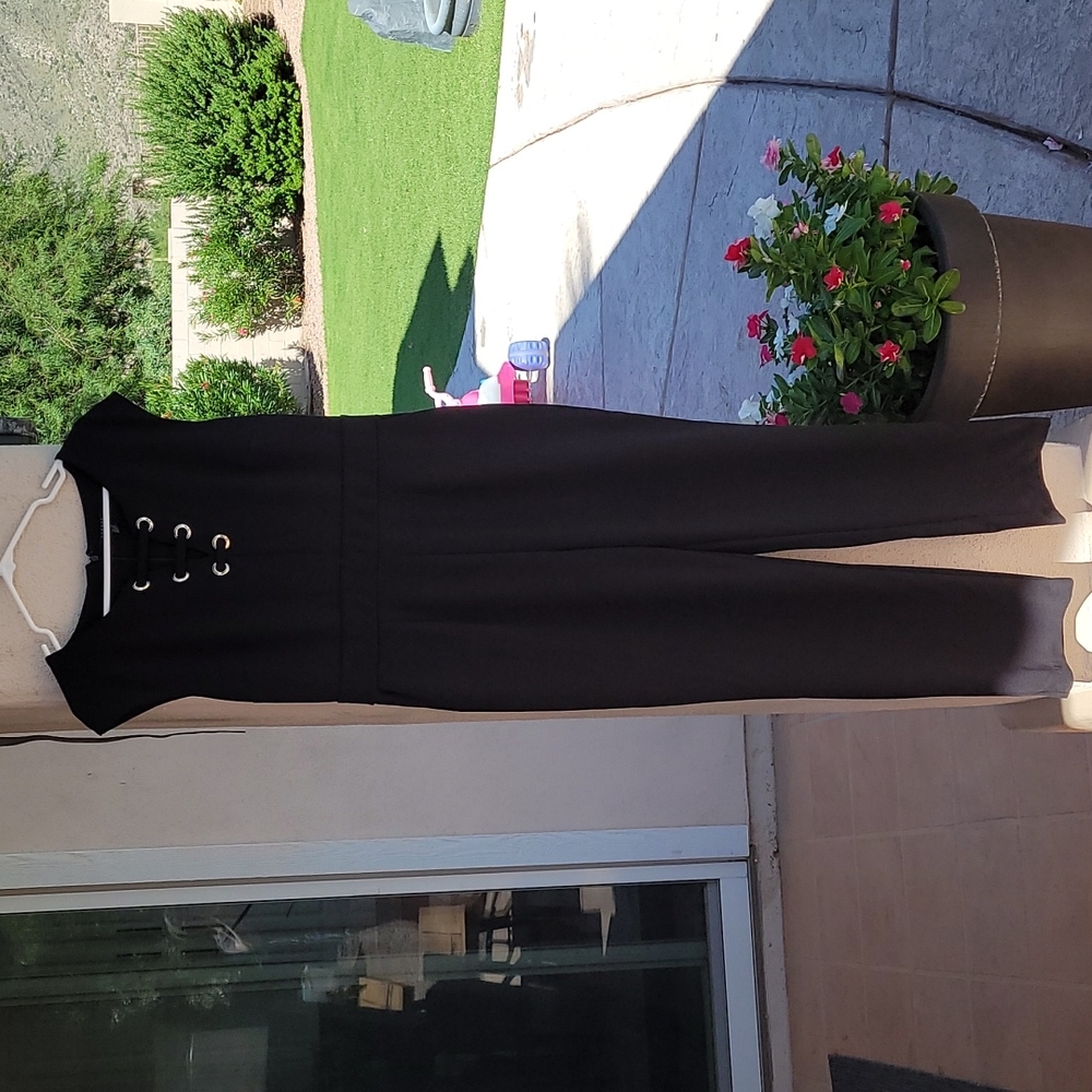 Black Spense jumpsuit with gold lace up front